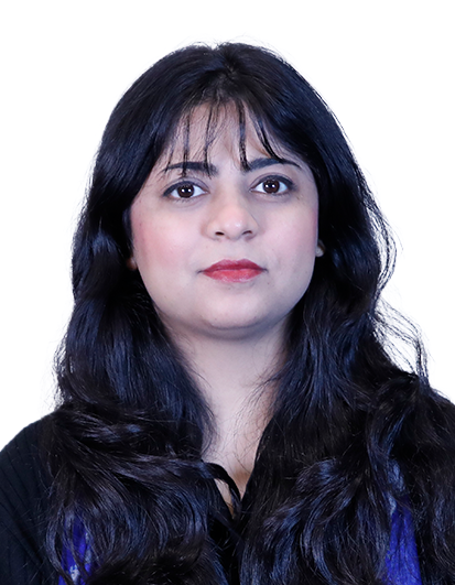 Head-and-shoulders portrait of a woman with long dark hair, wearing a black top, looking at the camera against a white background.