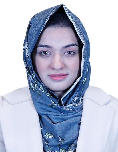 Portrait of a woman wearing a blue patterned hijab and a light coat, facing the camera with a neutral expression
